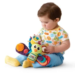 Lamaze Riikinkukko värikäs vauvan lelu